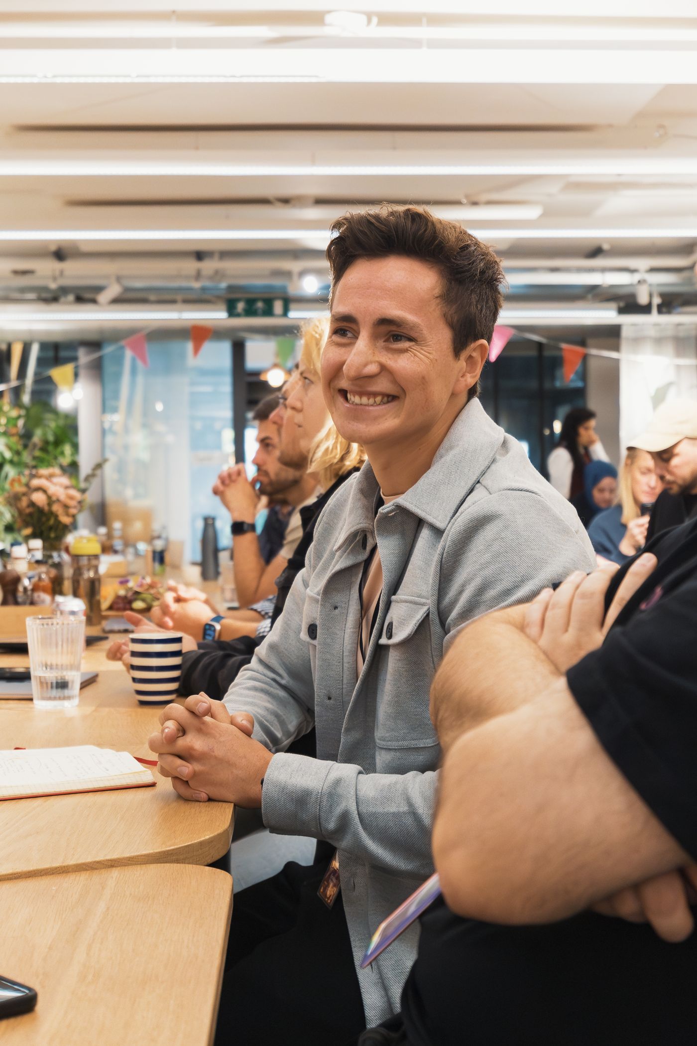 RICHO team collaborating in a modern office